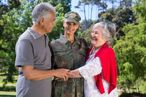 Female soldiers spending time with senior parents