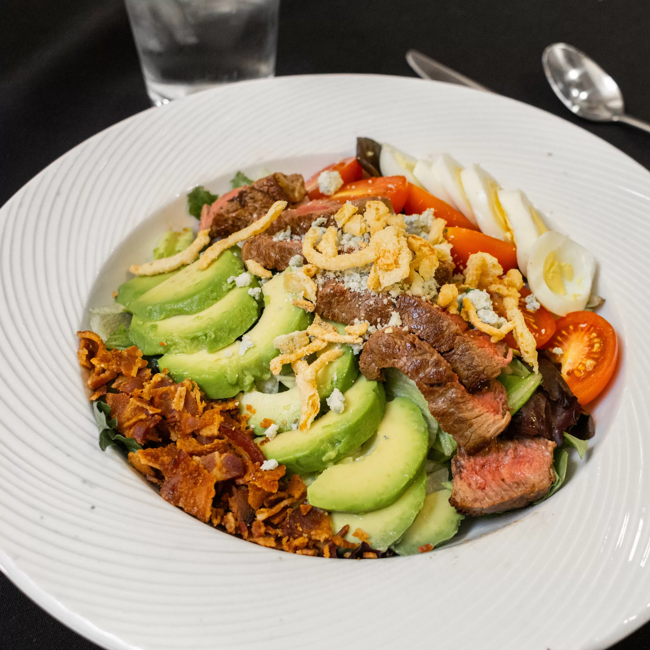 Dinner at the Terrace - seared steak salad with avocado, tomatoes, bacon, crispy onions 